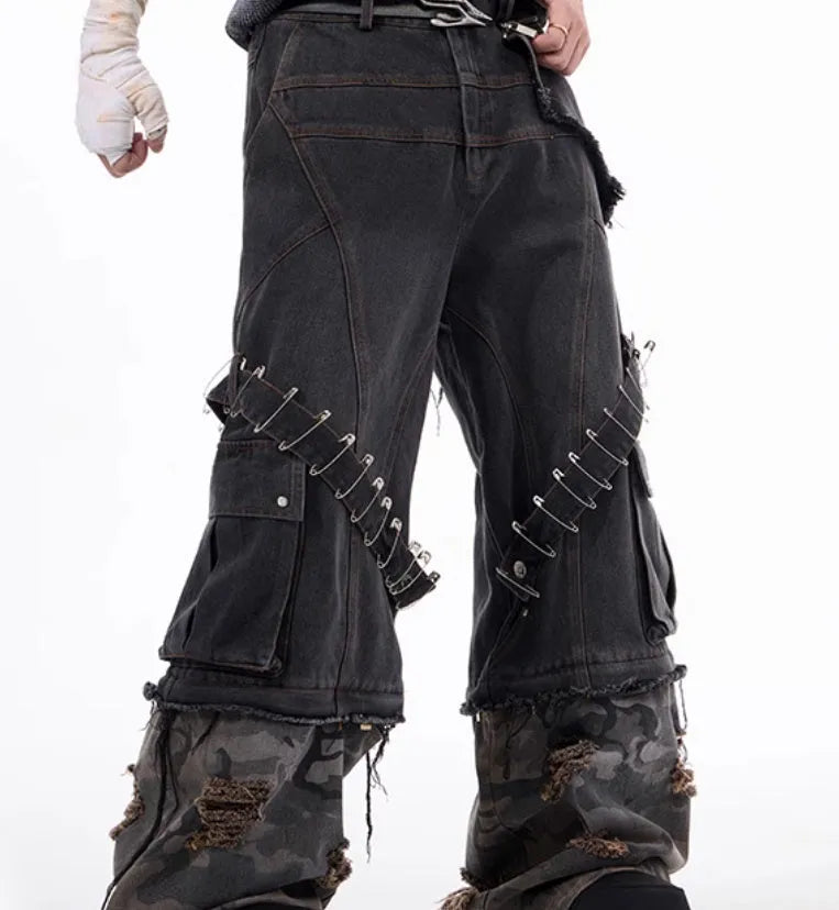 Men's grey and camouflage cotton jeans with splicing panel design and pin ribbon details.