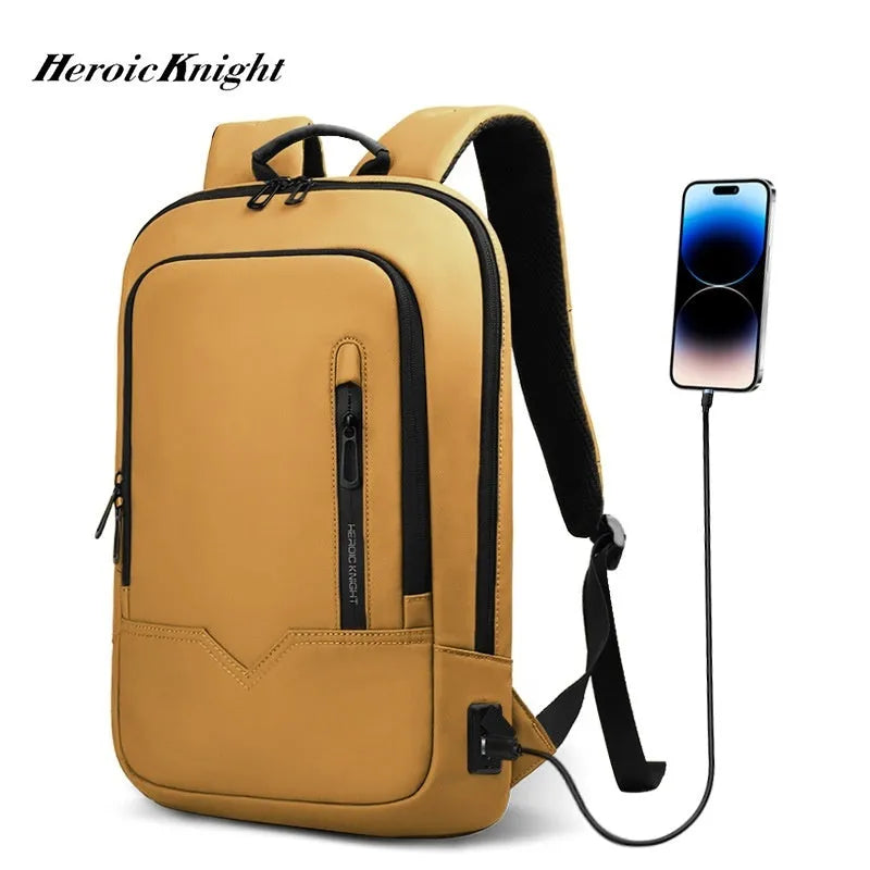 Solid colour lightweight polyester backpack with USB charging port on side, shown in multiple colour options.