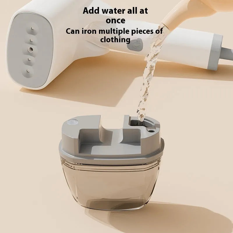 Blue and white handheld garment steamer unit with water tank and nozzle, shown for scale.