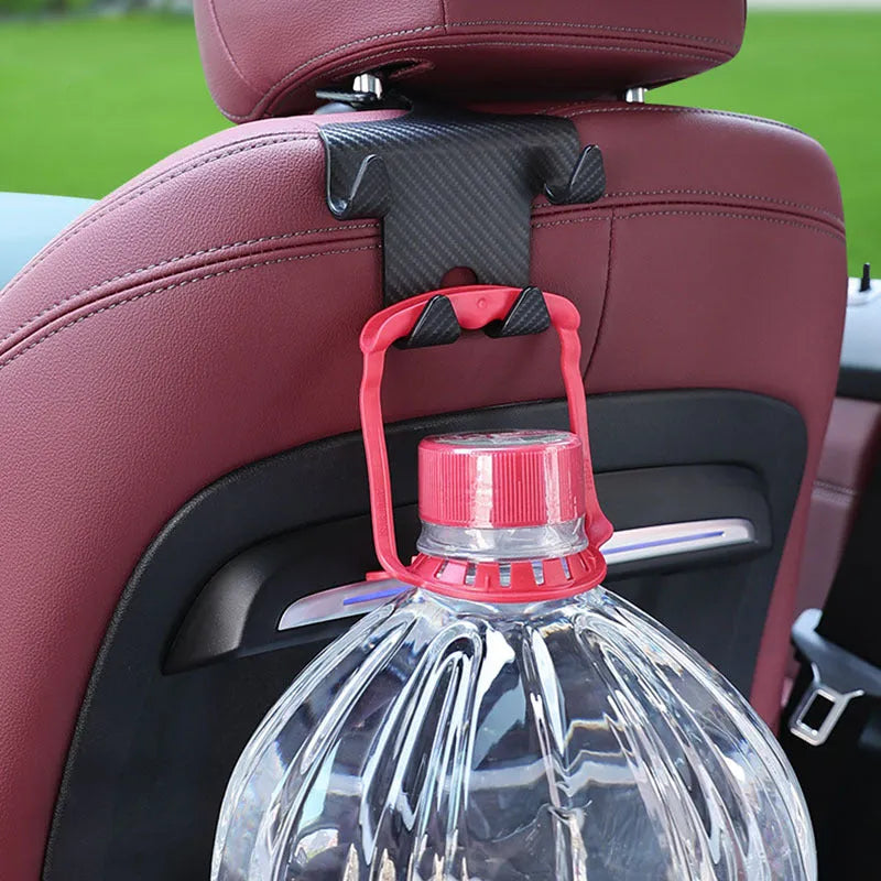 Black ABS plastic car hook and mobile phone holder for rear seat back storage.