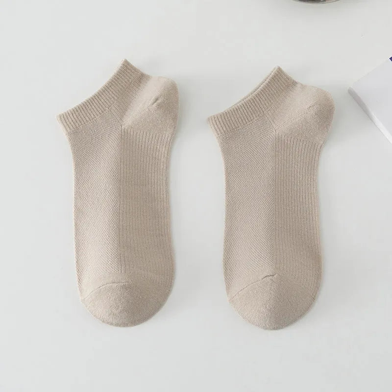 Men's solid colour polyester low-cut boat socks shown in one of six available colour options