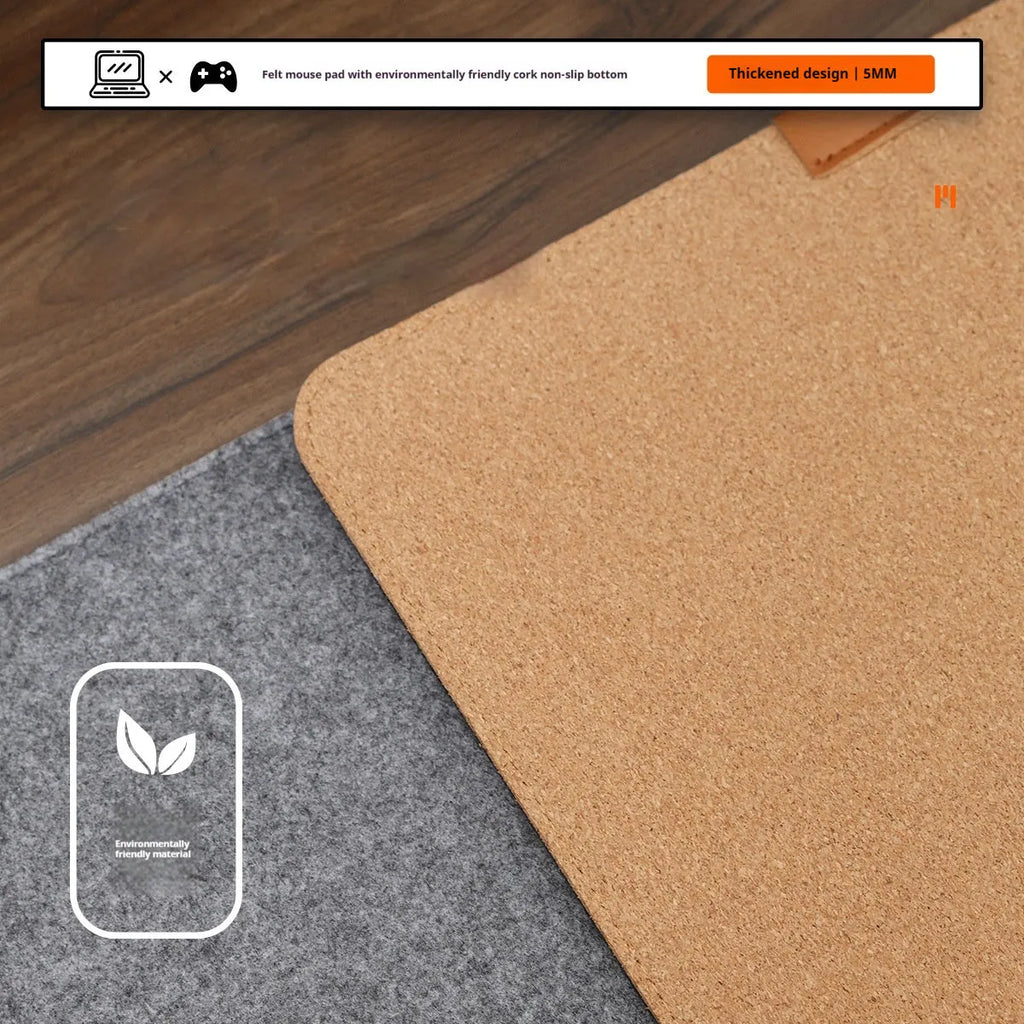 Oversized black grey felt and cork mouse mat on office desk with non-slip backing
