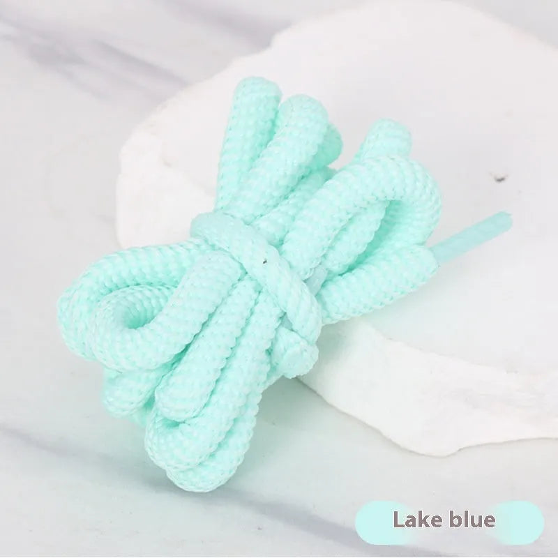 Oval elastic shoelace adapter ropes in various colours on a white background.