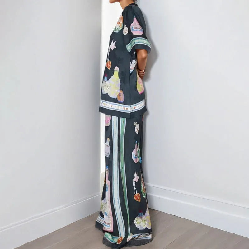 Black women's cardigan and pants set with cartoon animation pattern