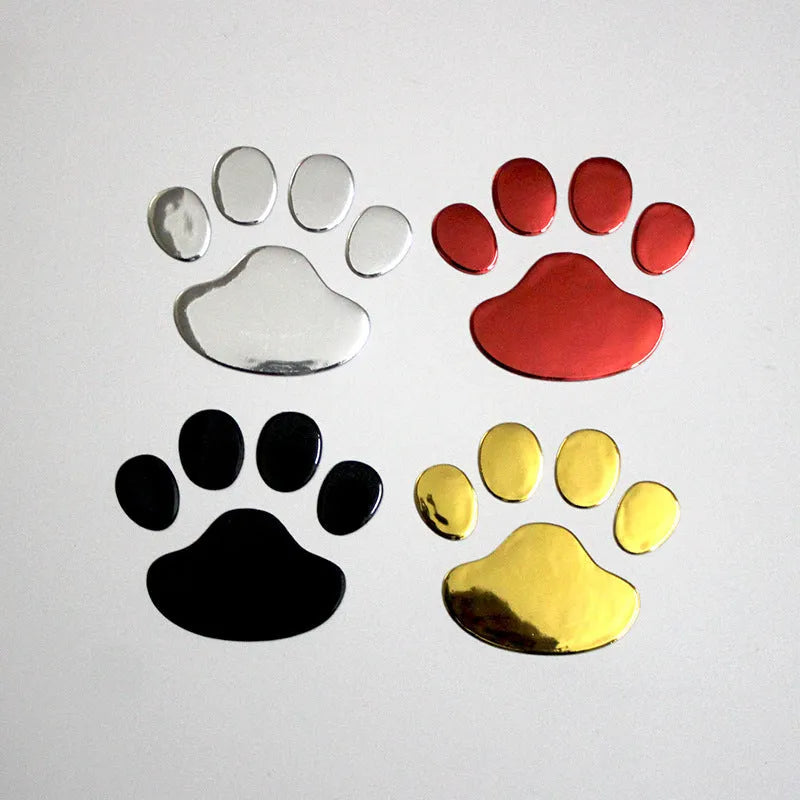 Pair of red dog footprint car stickers in a hand-shaped brush style on a white background.