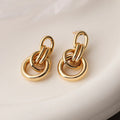 Geometric gold irregular earrings with asymmetrical copper alloy design for women
