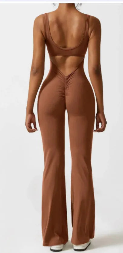Women's black yoga bodysuit with hollow seam design and built-in chest pads