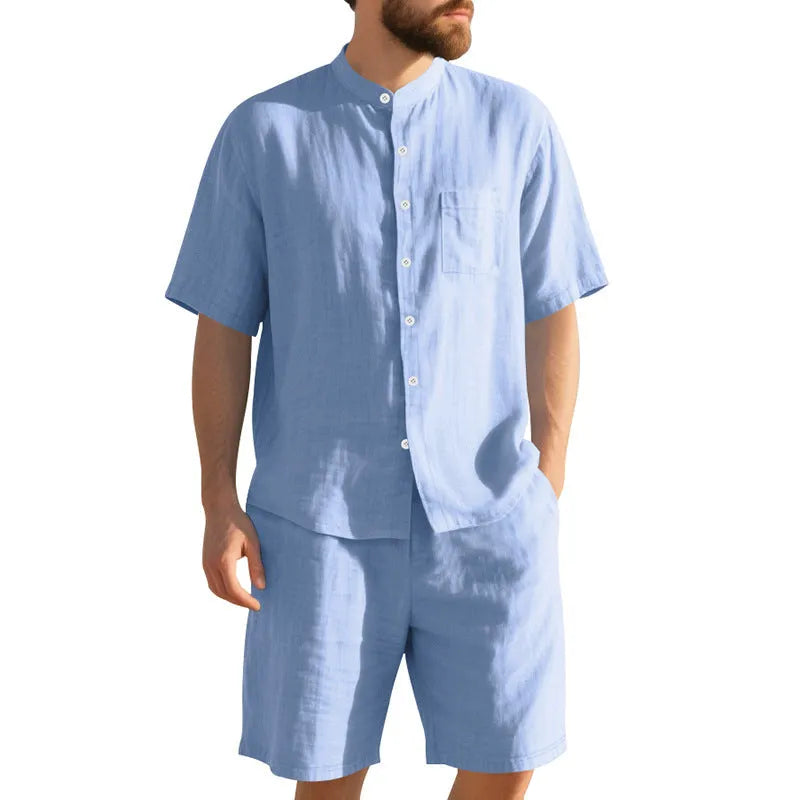 Men's light blue linen-blend summer suit with short sleeve shirt jacket and matching shorts on a hanger.