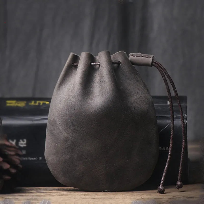 Vintage cowhide drawstring bundle wallet in genuine leather with sewing thread detail