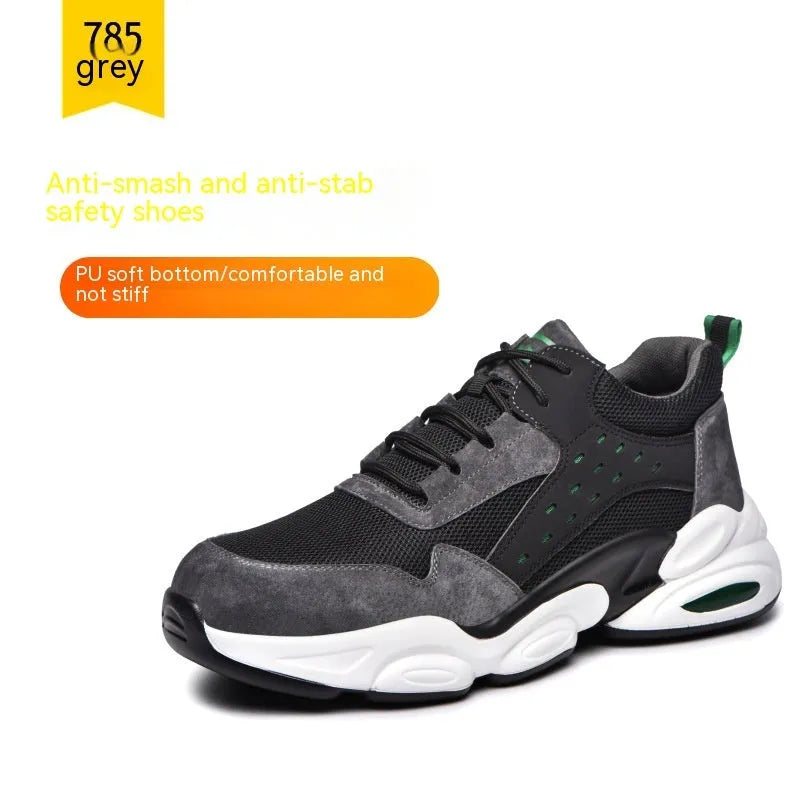 Black mesh breathable labour insurance safety work shoes with a PU soft sole on a grey background.