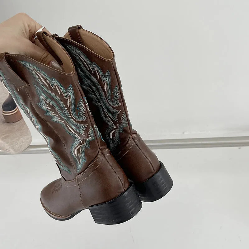 Brown women's mid-calf boots with embroidered pattern, square heel, and leather lining