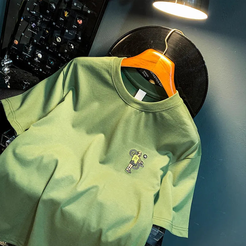 Green men's loose fit T-shirt with printed design and short sleeves for sports and casual wear
