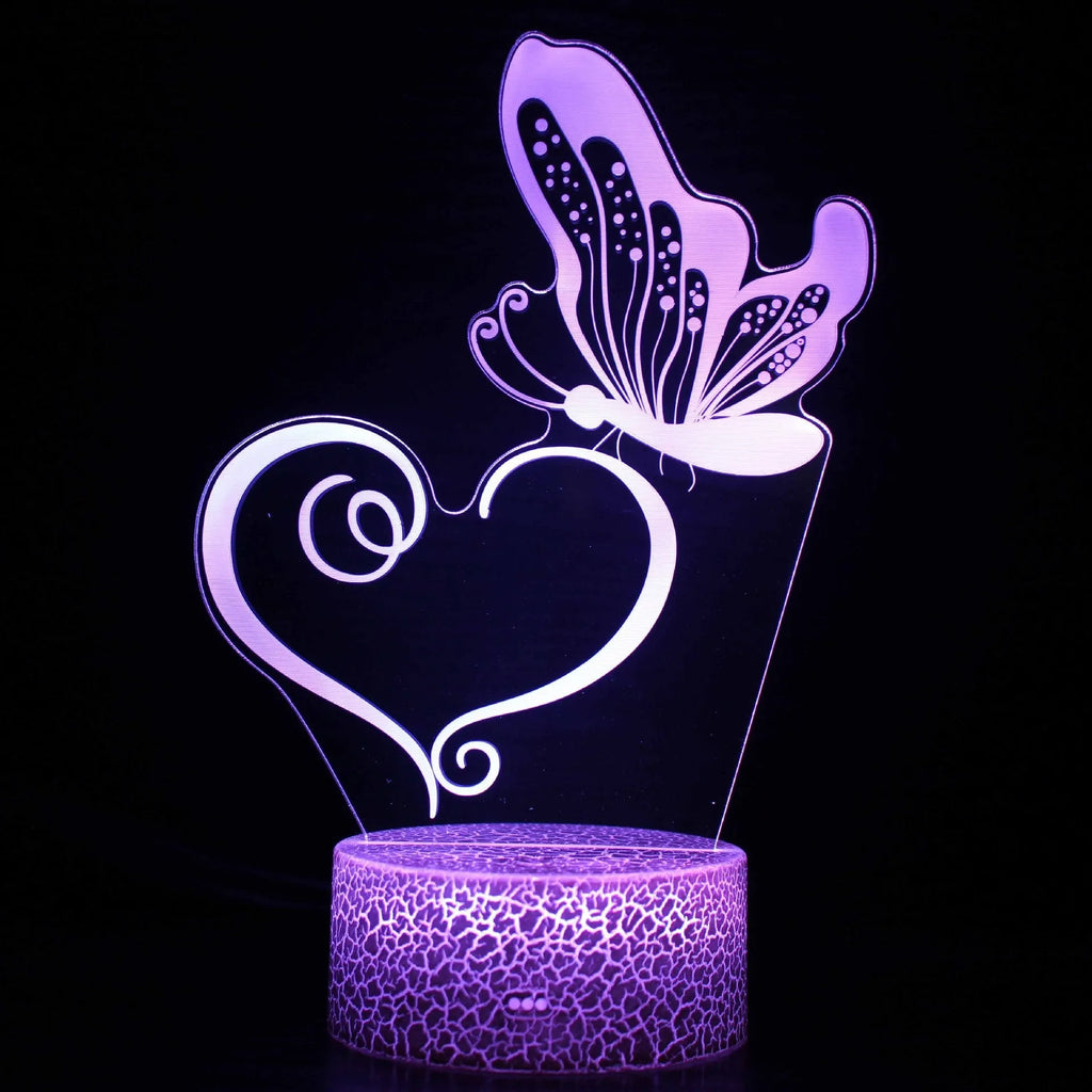 Colourful acrylic 3D touch USB table lamp with ABS base on a desk