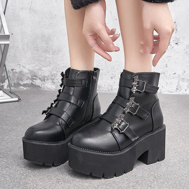 Black women's Harajuku punk gothic short boots with bat buckle and side zip.