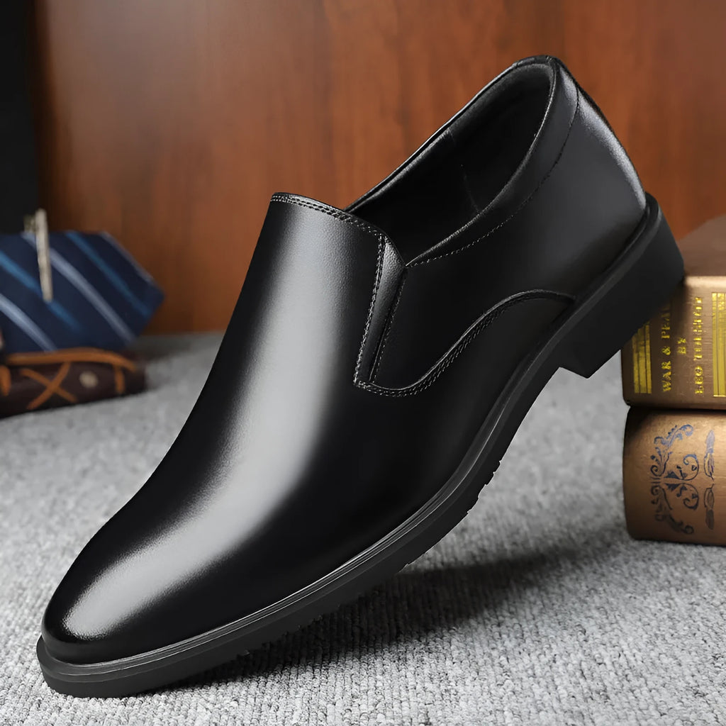 Men's black business casual slip-on leather shoes with a low-top design and rubber sole