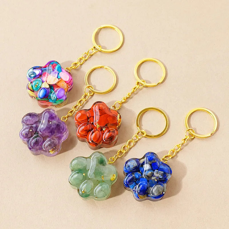 Natural crystal cat's paw keychain pendant charm in one of ten crystal types including pink crystal and amethyst.