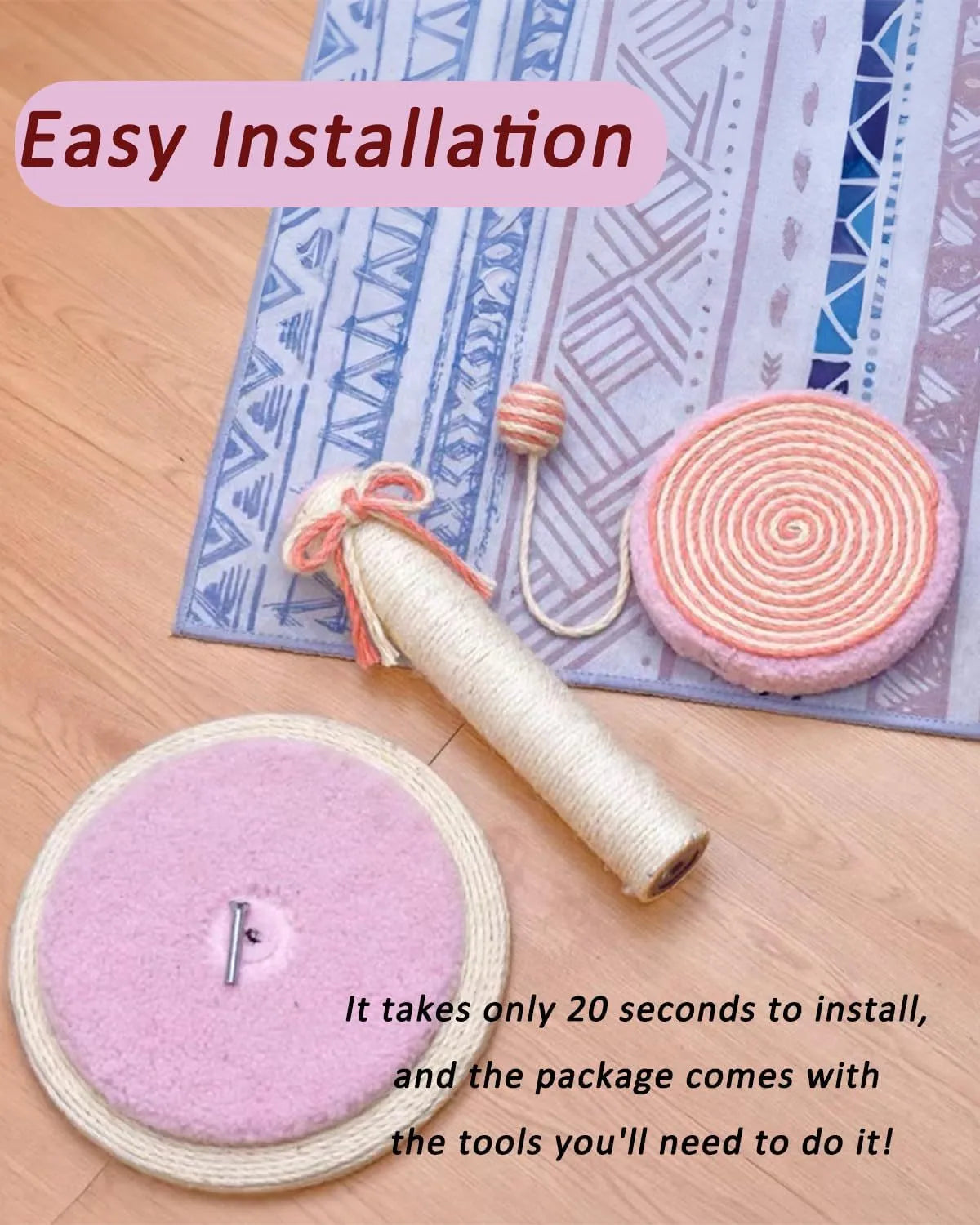 Cat scratching post with sisal rope surface and hanging ball toy on sturdy wood base
