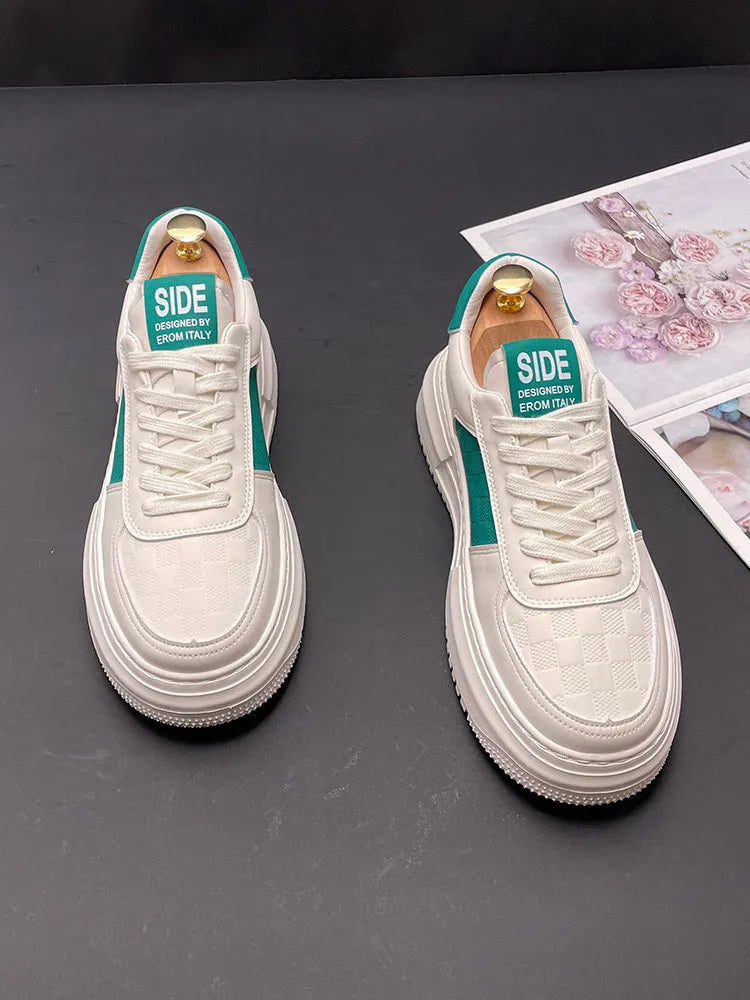 White sports casual shoes with cloth upper and rubber foam sole, available with green or black accents