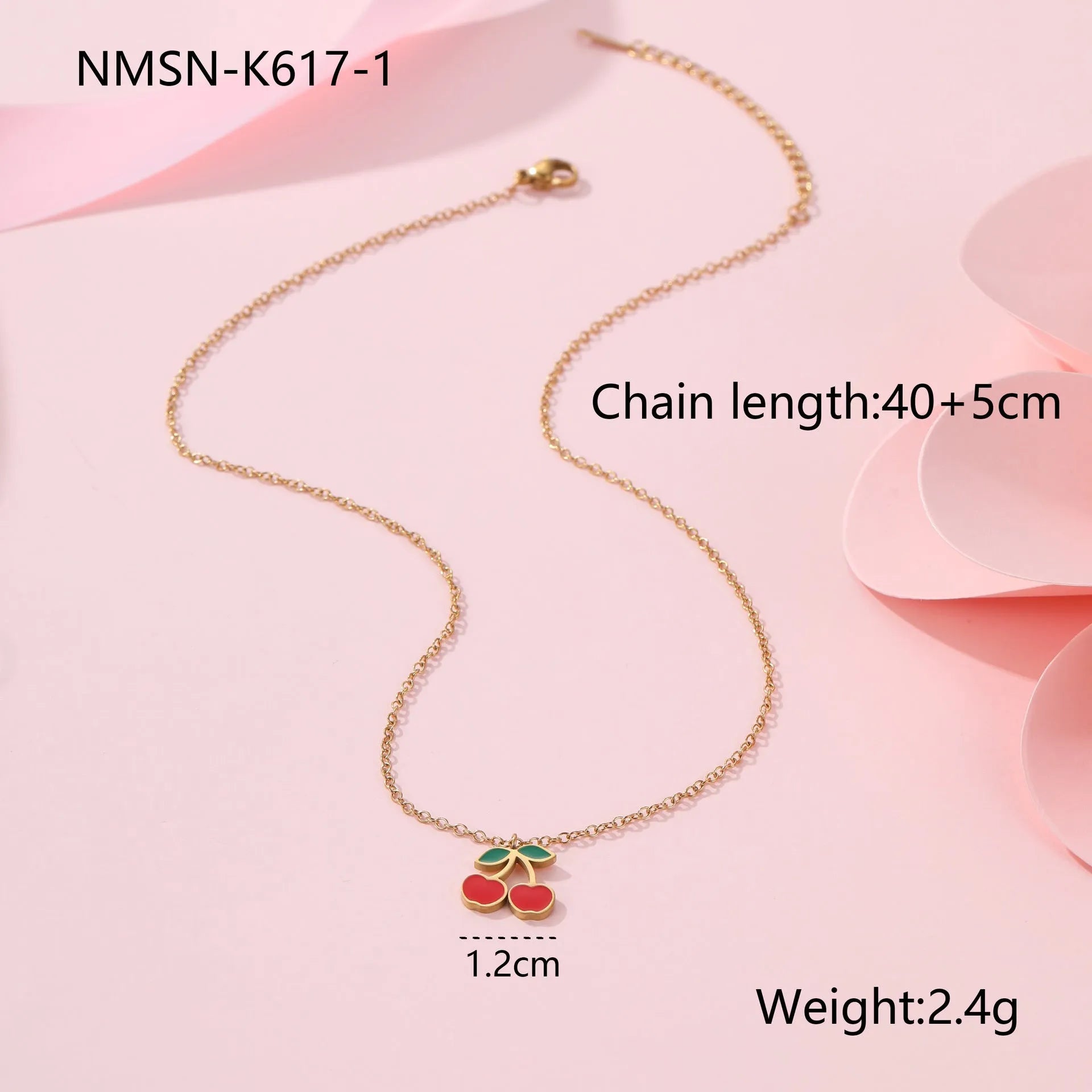 Cherry jewellery set showing necklace, bracelet, earrings, and ring in stainless steel with 18K electroplated finish
