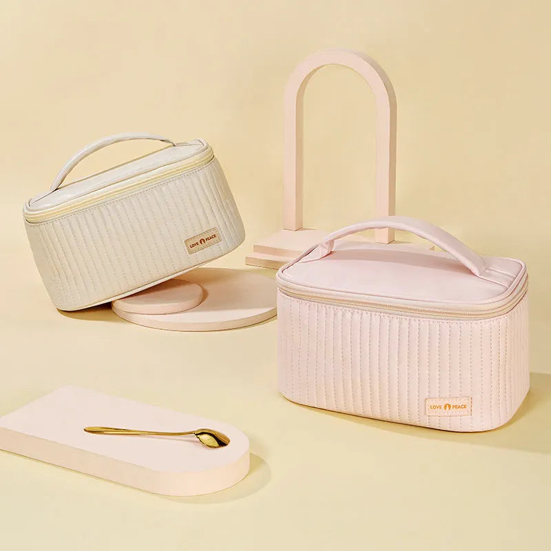 Open-top PU leather makeup bag in a pastel colour from a range of six options.