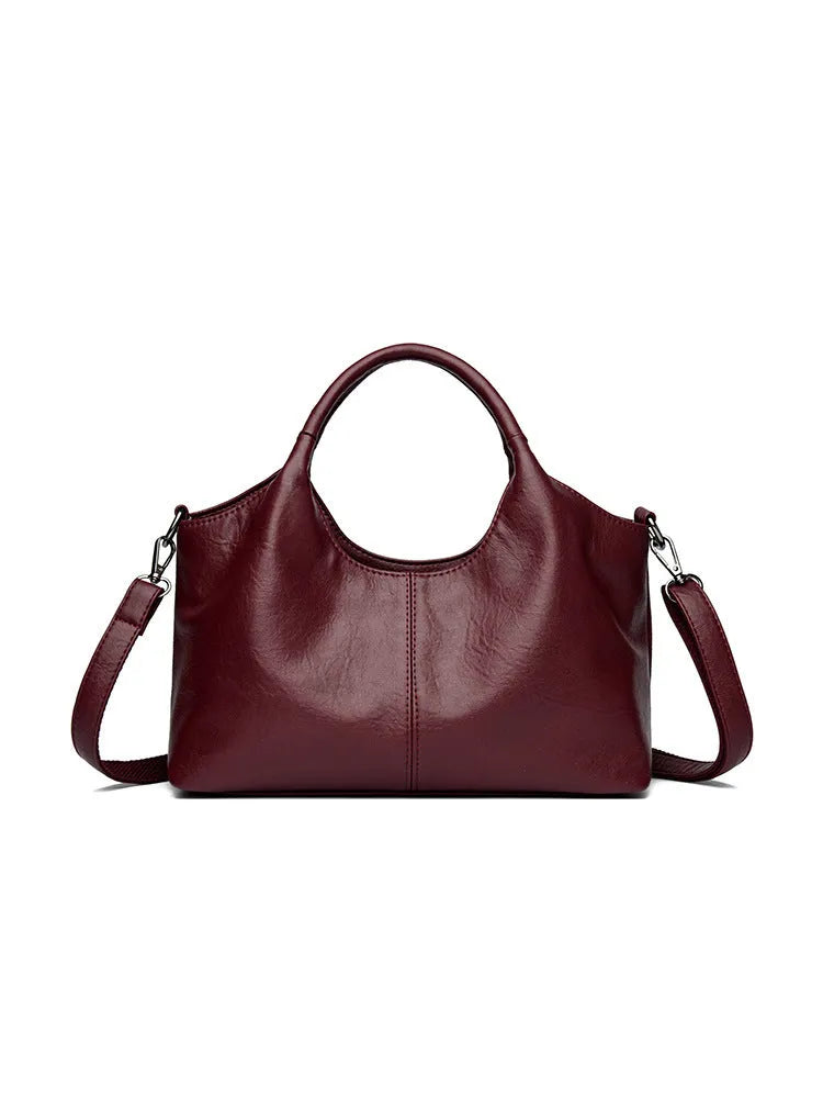 Genuine leather women's cross-body bag in black with soft texture and large capacity design