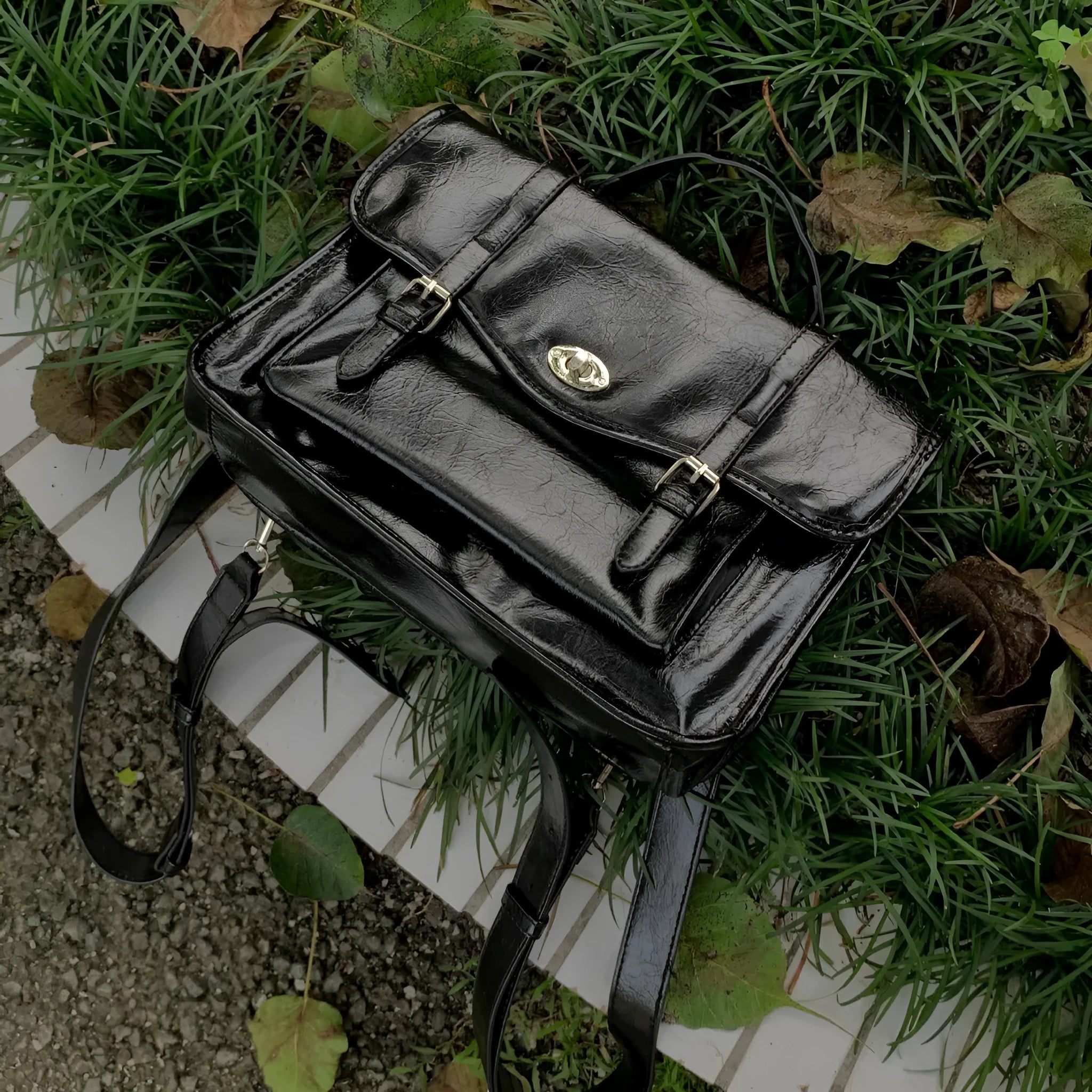 Black college messenger bag with oil wax PU leather finish showing dimensions 35cm length