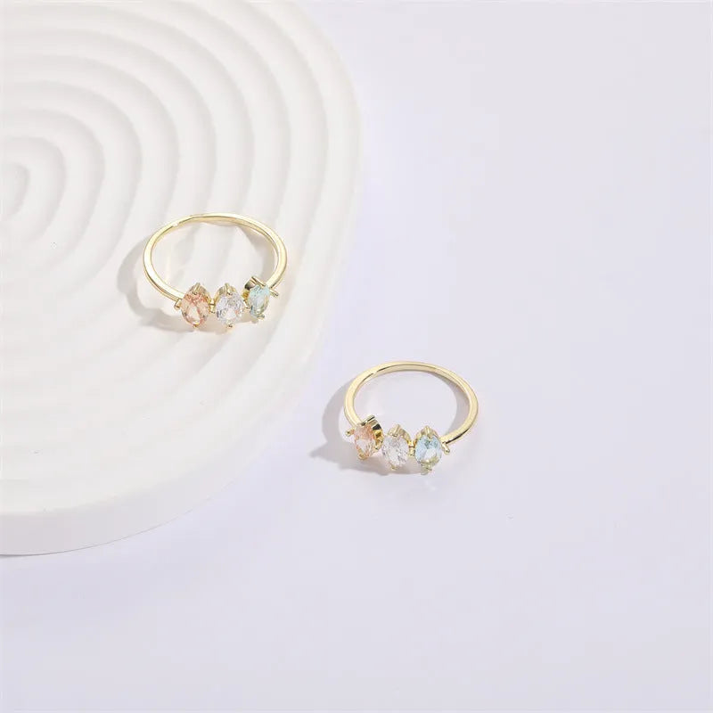 Mother's Day birthstone ring with triangle horse eye design and tricolor zircon stones in 14K gold plate.