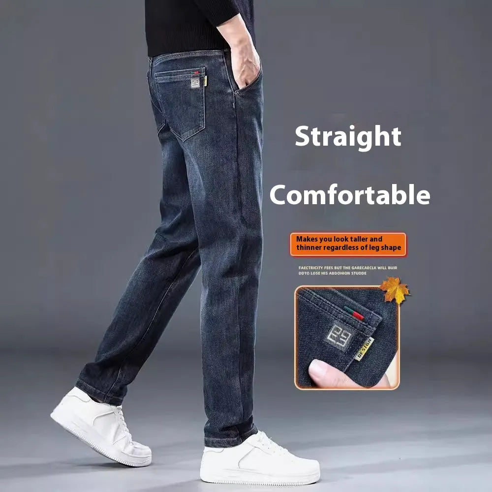 Blue grey slim straight casual trousers with a mid-waist and elastic comfort on a neutral background.