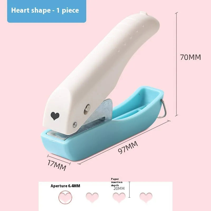 Small manual craft punching machine with Love, Star, 4mm and 6mm round embossing heads.