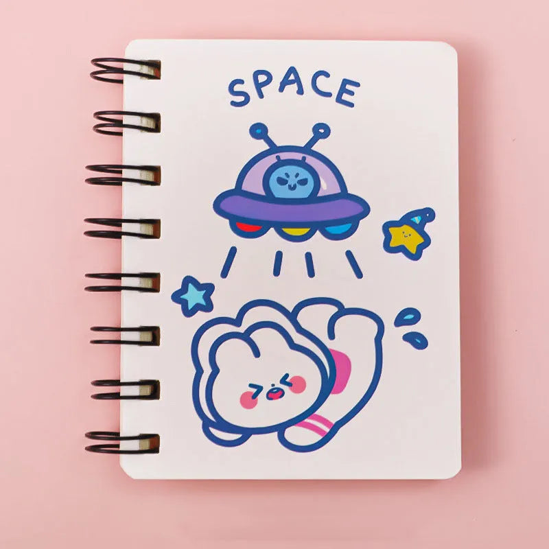 Astronaut-themed flipper notebook measuring 10.5cm by 8cm with space design cover options