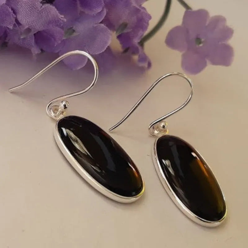 Women's earrings with oval black agate pendants on 925 silver and alloy geometric design