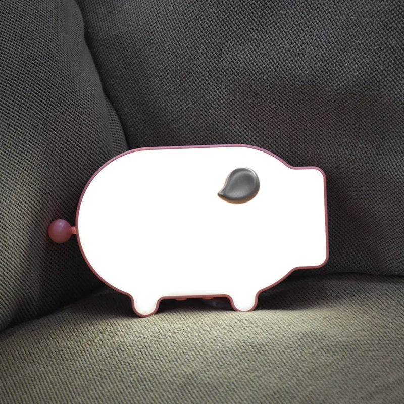 Multifunctional LED alarm clock with temperature display and USB charging port in blue or pink