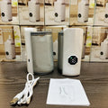 Grey and white car charger electric milk warmer with 12V plug for vehicle beverage heating