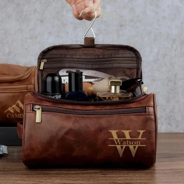 Men's black PU travel bag with a separate makeup pouch included