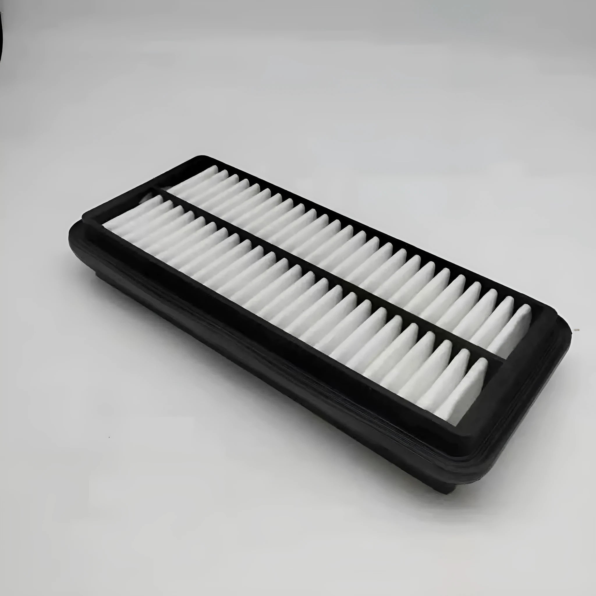 Black rectangular car air filter measuring 256mm by 113mm by 40mm