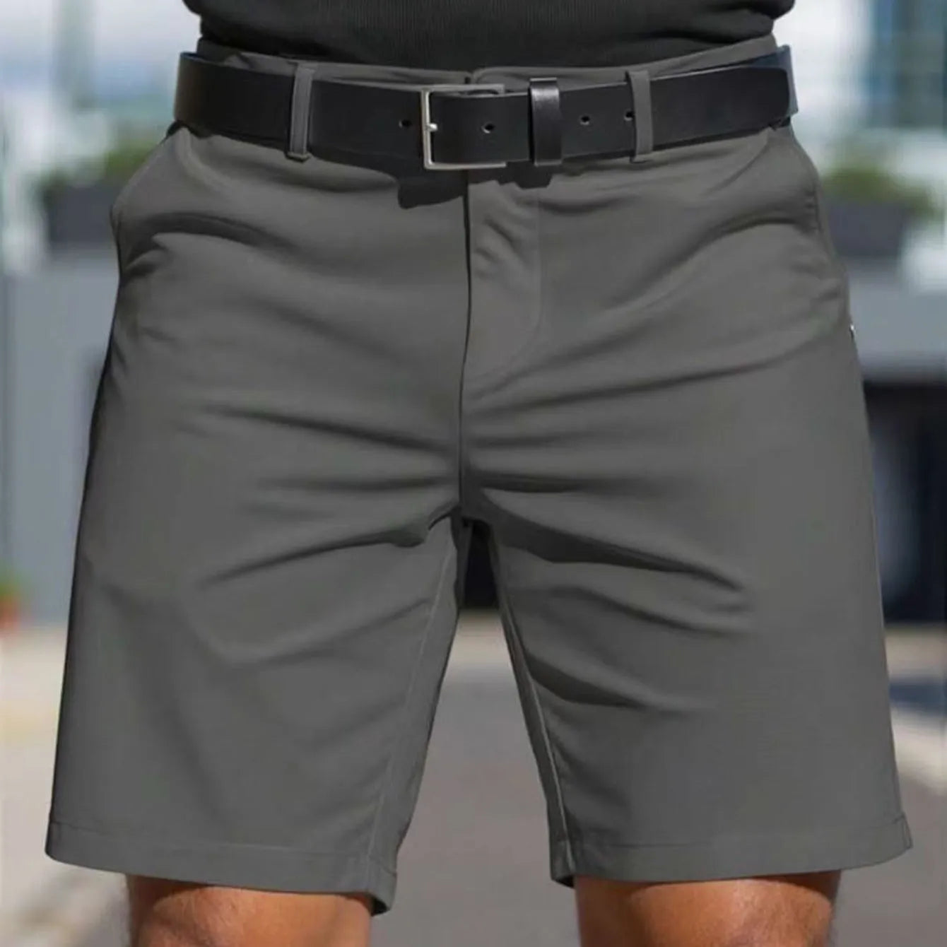 Men's solid colour straight-cut elastic fifth pants in light grey on a hanger.