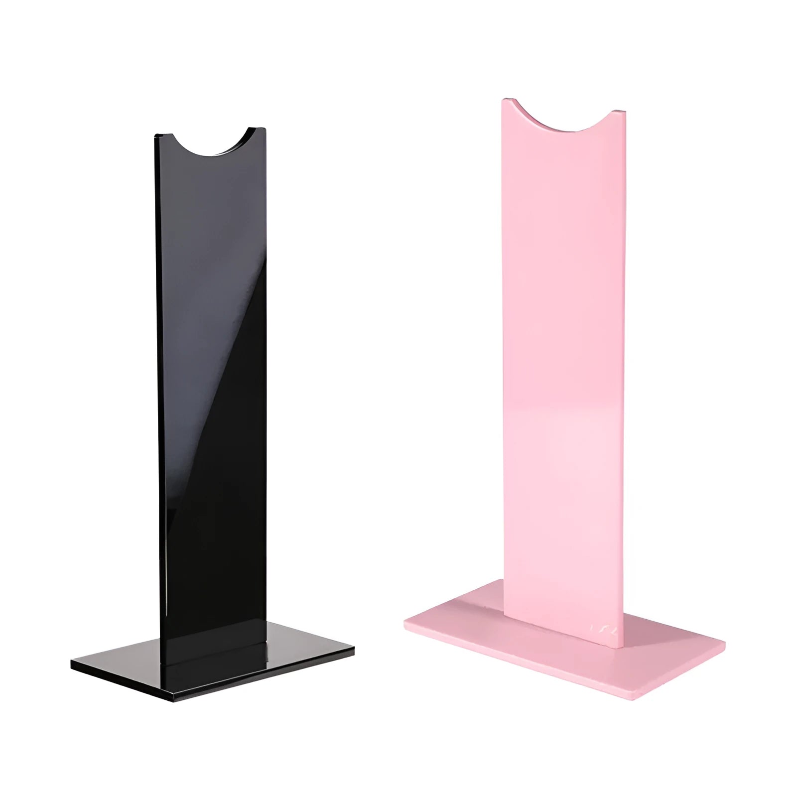Pink detachable headphone stand for gaming headsets on a desk, shown next to its disassembled parts.
