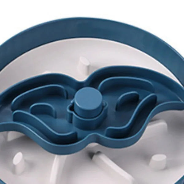 Grey plastic pet bowl with rotating windmill-pattern slow feeder licking mat inside