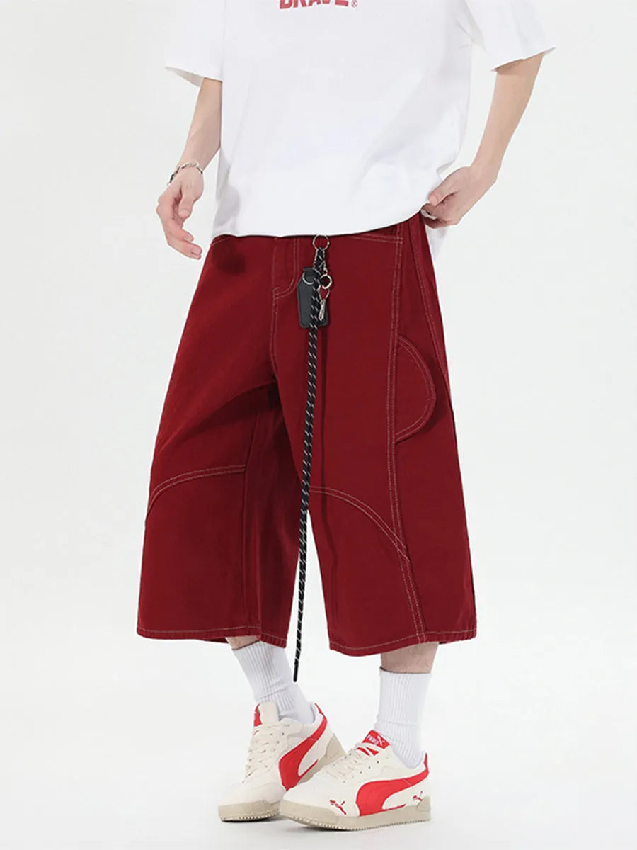 Retro denim workwear shorts with wide leg cut and multiple pockets in red colour