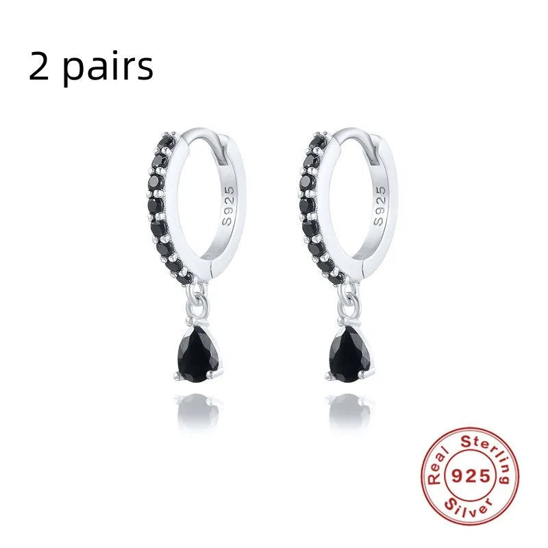 Geometric water drop earrings in Sterling Silver with electroplated gold finish and purple diamond stones