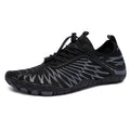 Outdoor sports shoes in multiple colours with lace-up front and rubber sole.