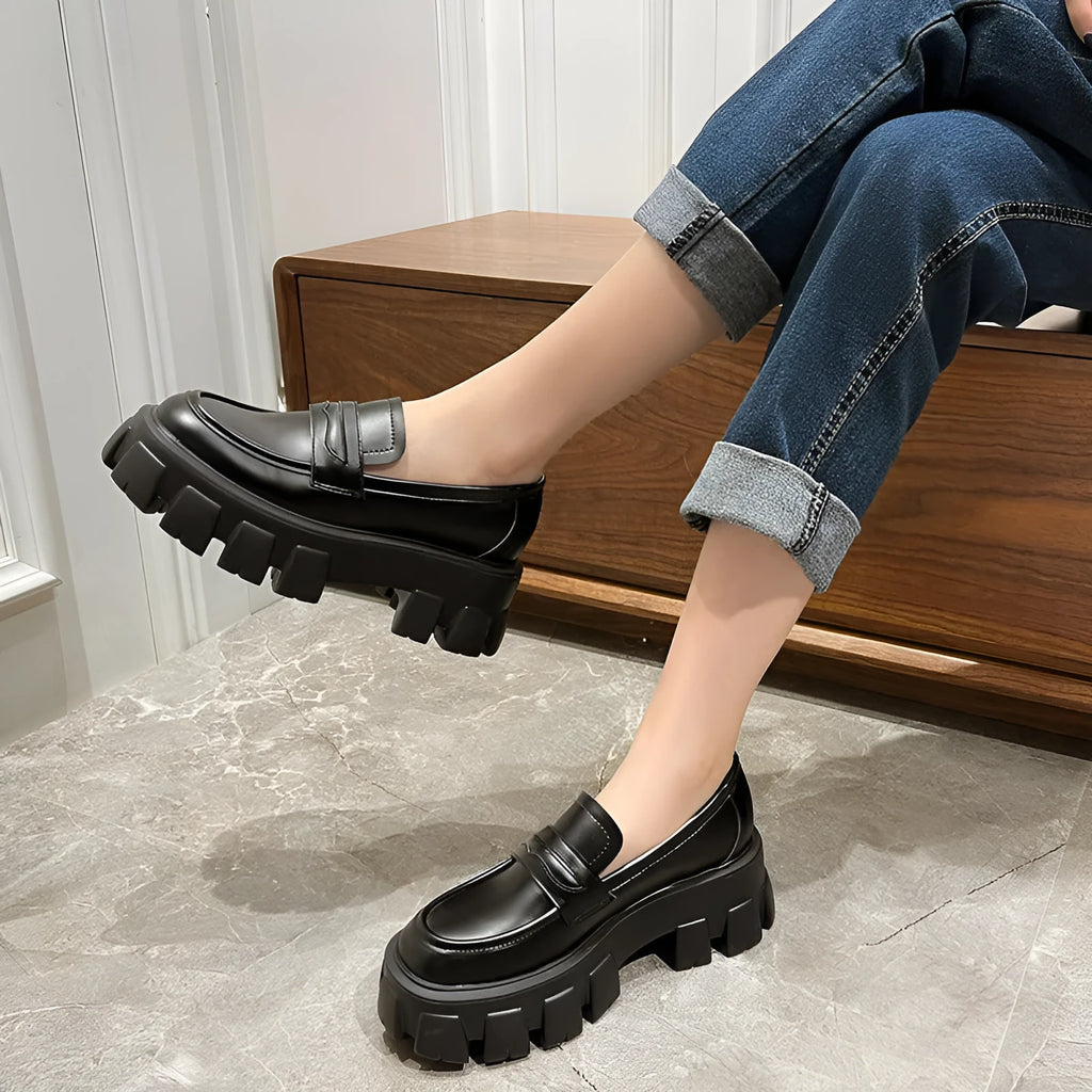 British style wide fit loafers for men and women in either matte or glossy patent leather.