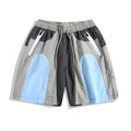 Blue men's loose patchwork quick-drying sports shorts with straight legs and elasticated waist.