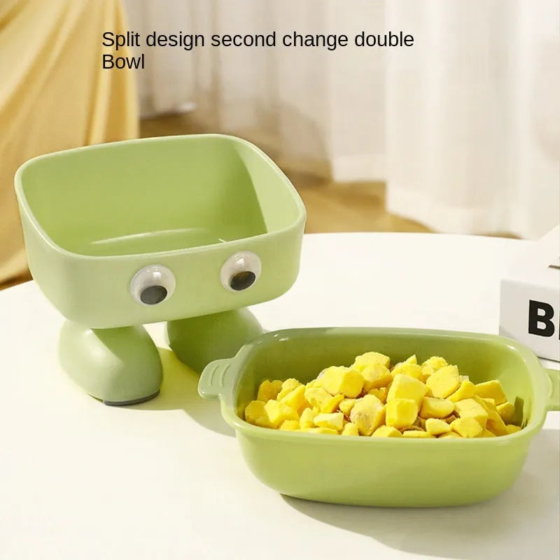 Green robot-shaped elevated cat bowl with tilted design and detachable inner dish