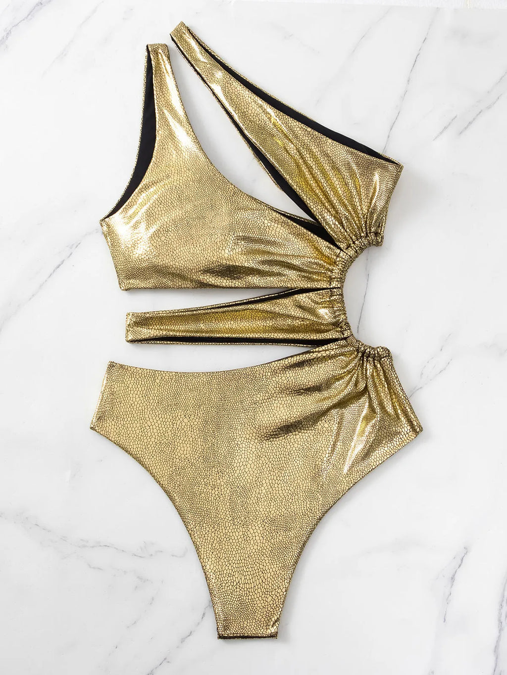 Women's C3177 gold backless one-piece swimsuit on a white background.
