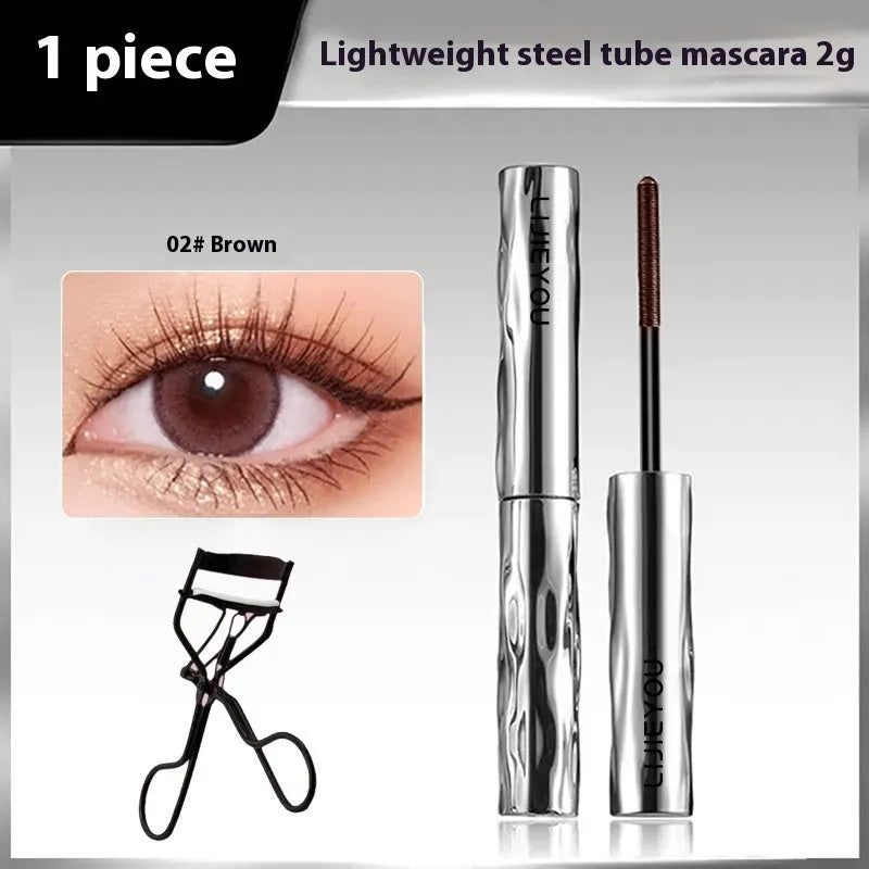 Waterproof mascara in steel tube with black and brown shades and optional eyelash curler