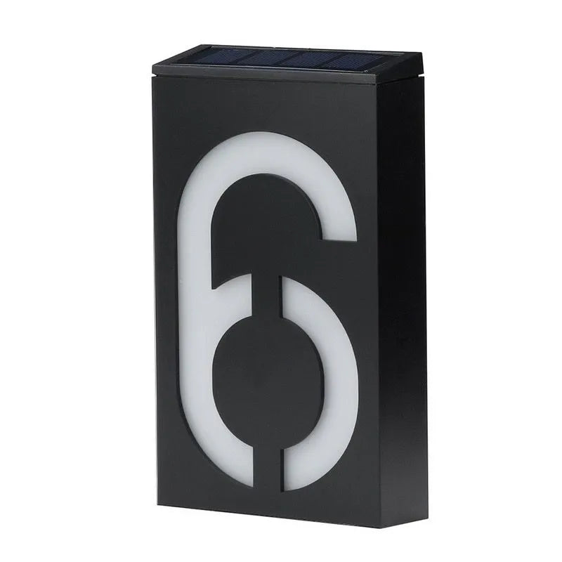 Solar powered house number light with LED illumination and waterproof housing for outdoor installation