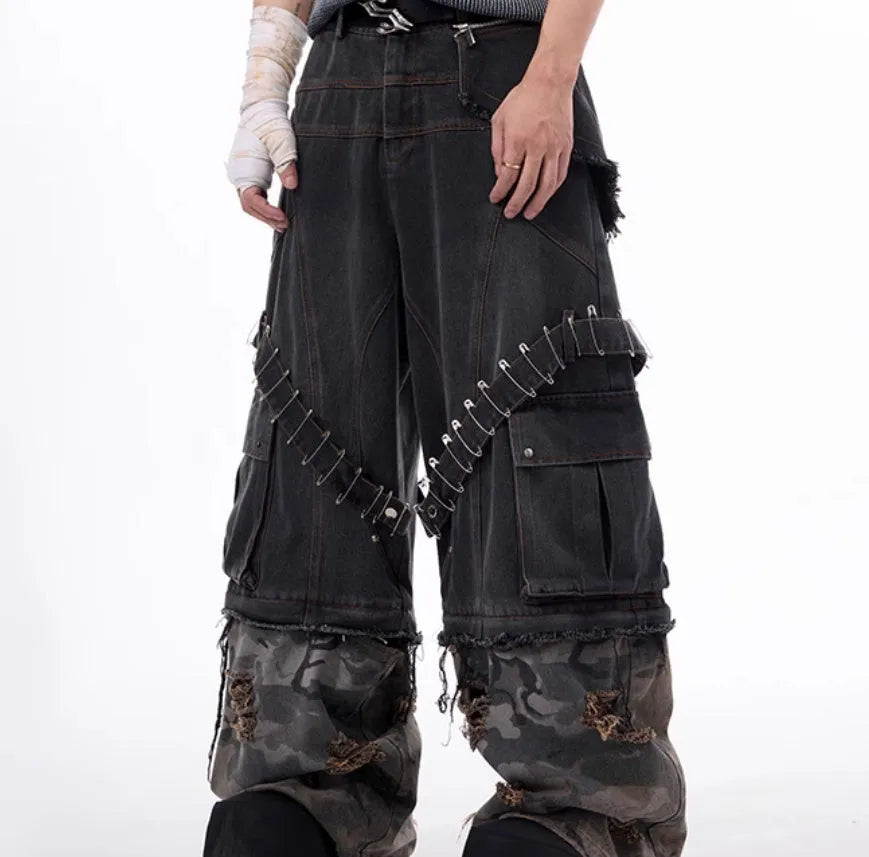 Men's grey and camouflage cotton jeans with splicing panel design and pin ribbon details.
