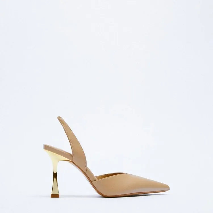 Apricot and black patent leather pointed high heels with a shallow-cut vamp, shown from the side.