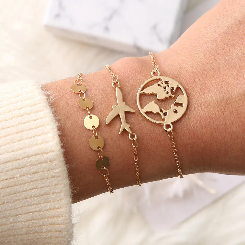 Women's bohemian aircraft map charm bracelet set with three alloy bracelets